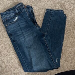 American Eagle Outfitters Women's Deep Blue Skinny Jeans with distressed knees